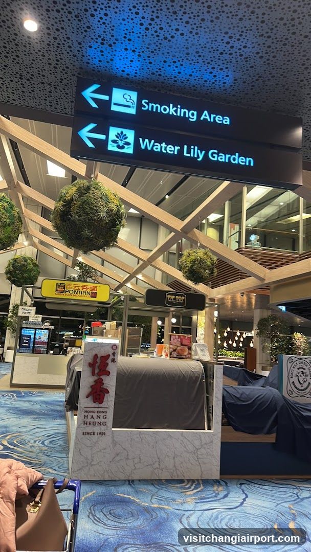 Airport Terminal Interior with Food Stalls and Signage