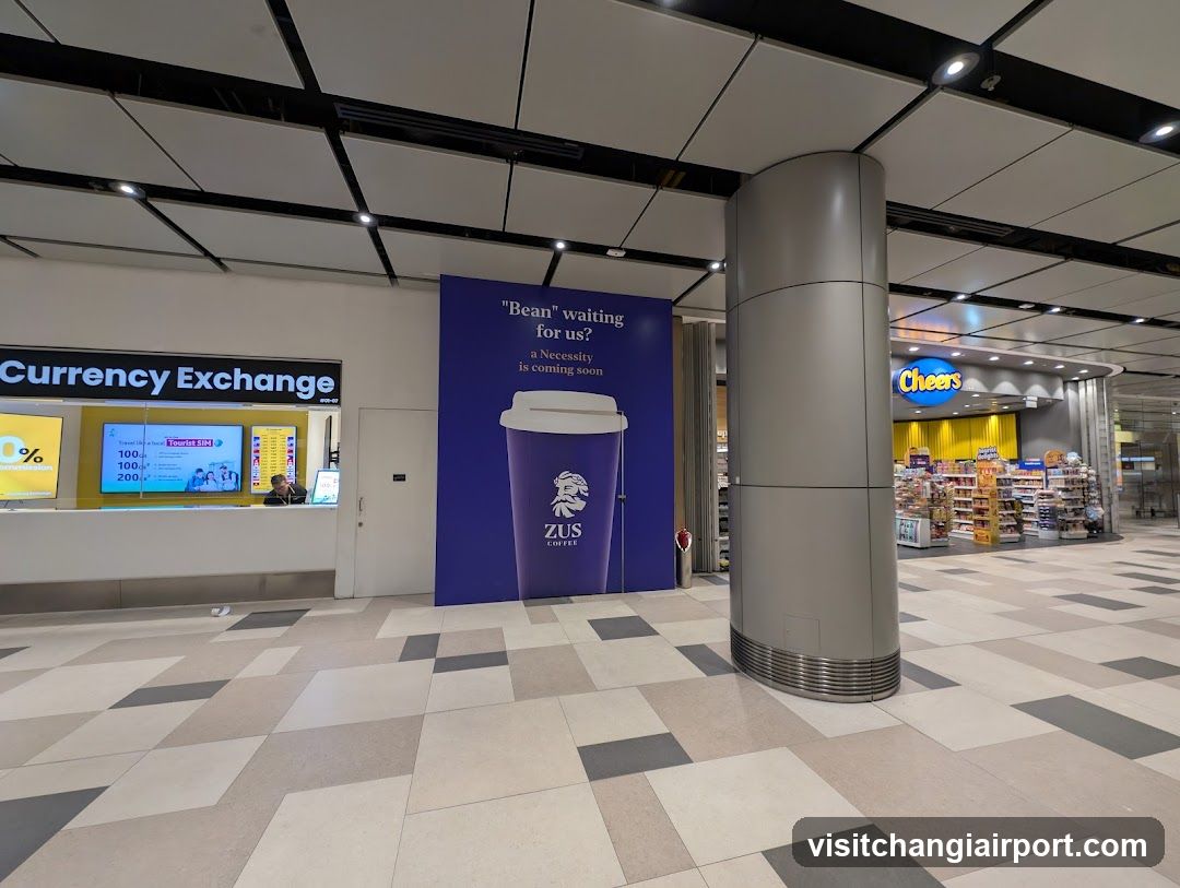 Airport Terminal Interior with Currency Exchange and Coffee Ad