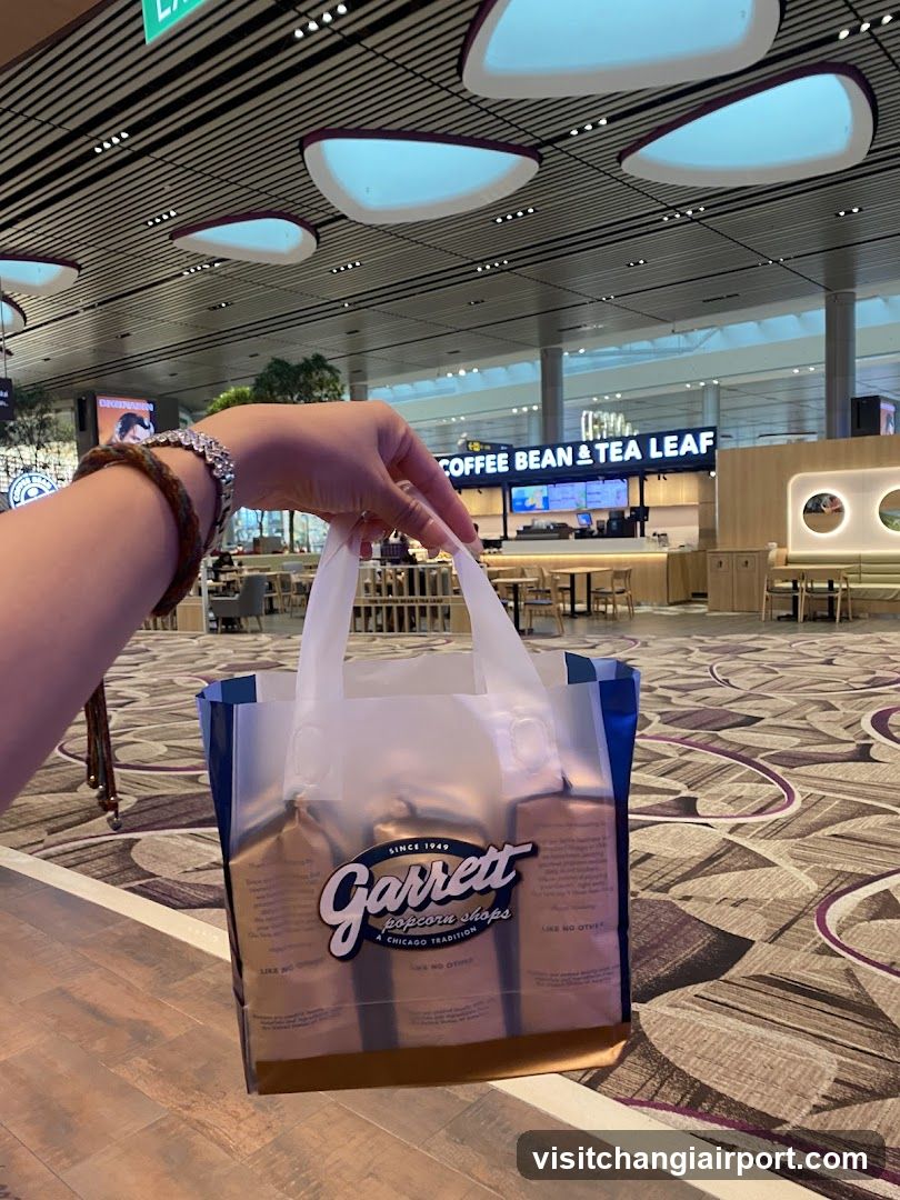 Garrett Popcorn Shop bag in airport terminal