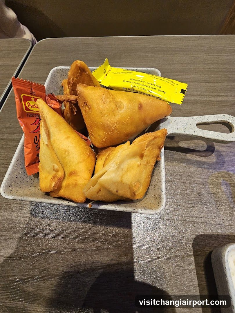 Samosa with condiments