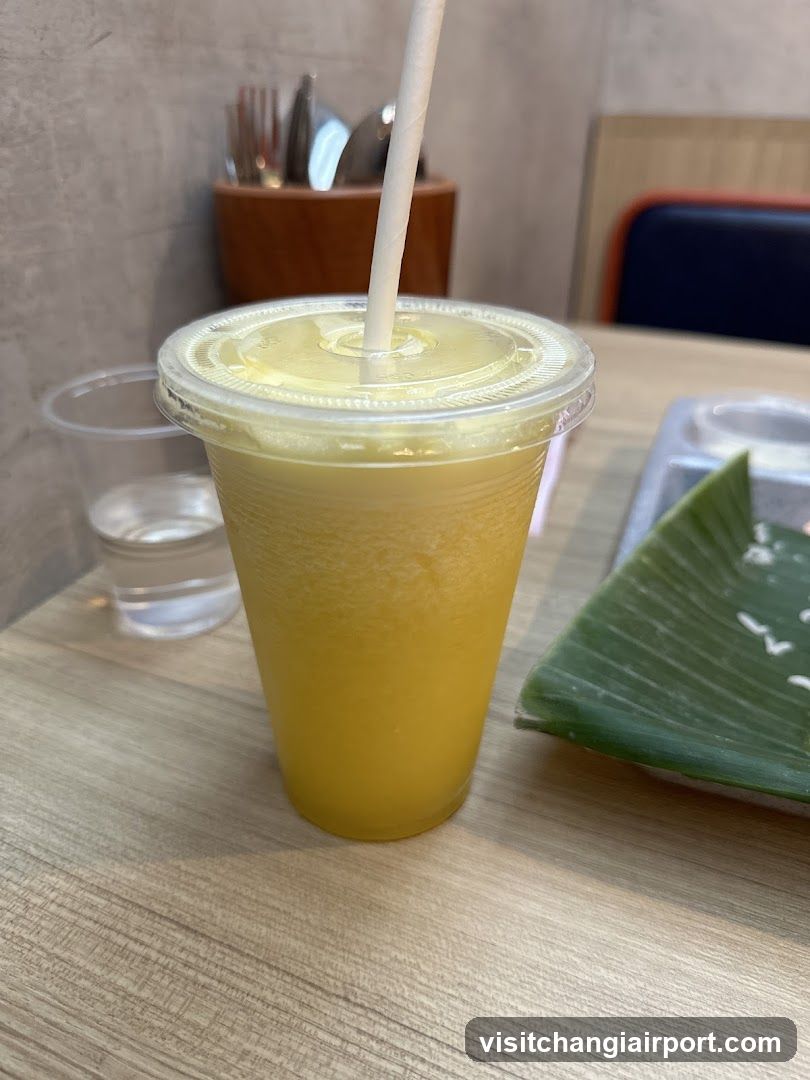 Yellow Juice with Straw