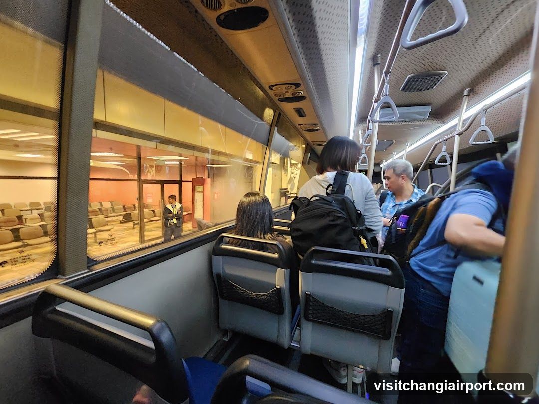 Bus Interior with Passengers and Staff