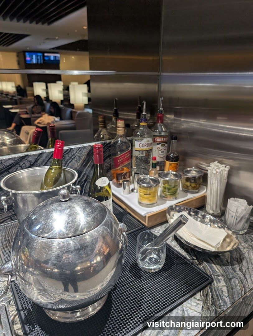 Bar Counter with Bottles and Ice Buckets