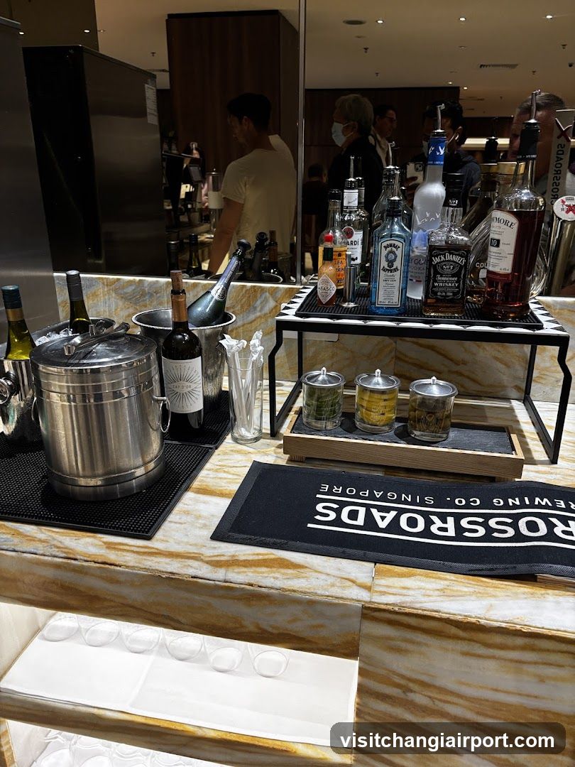 Bar Counter with Bottles and Ice Buckets