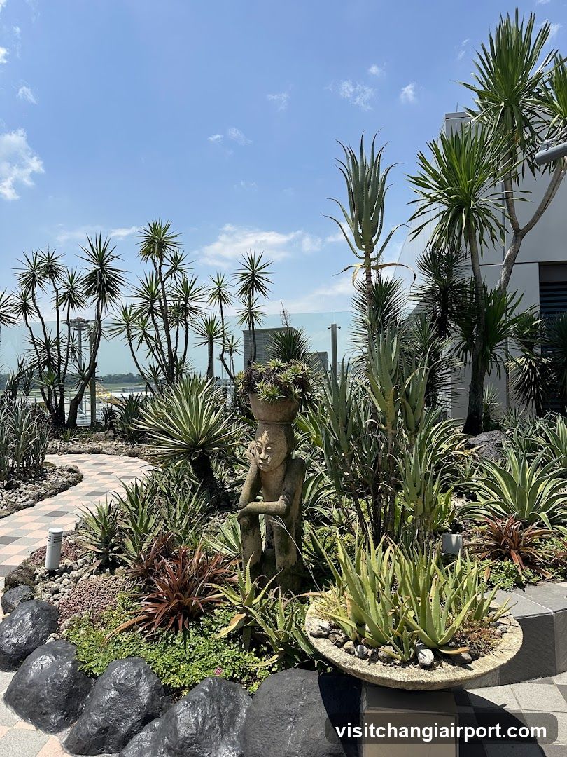 Garden with Statue and Plants