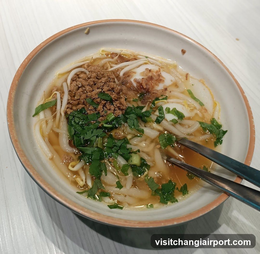 Bowl of Noodles with Minced Meat and Greens