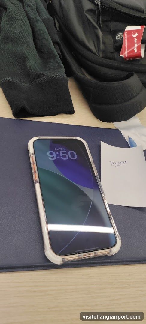 Phone on Table with Backpack Nearby