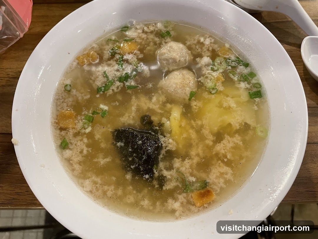 Soup Bowl with Meatballs and Scallions