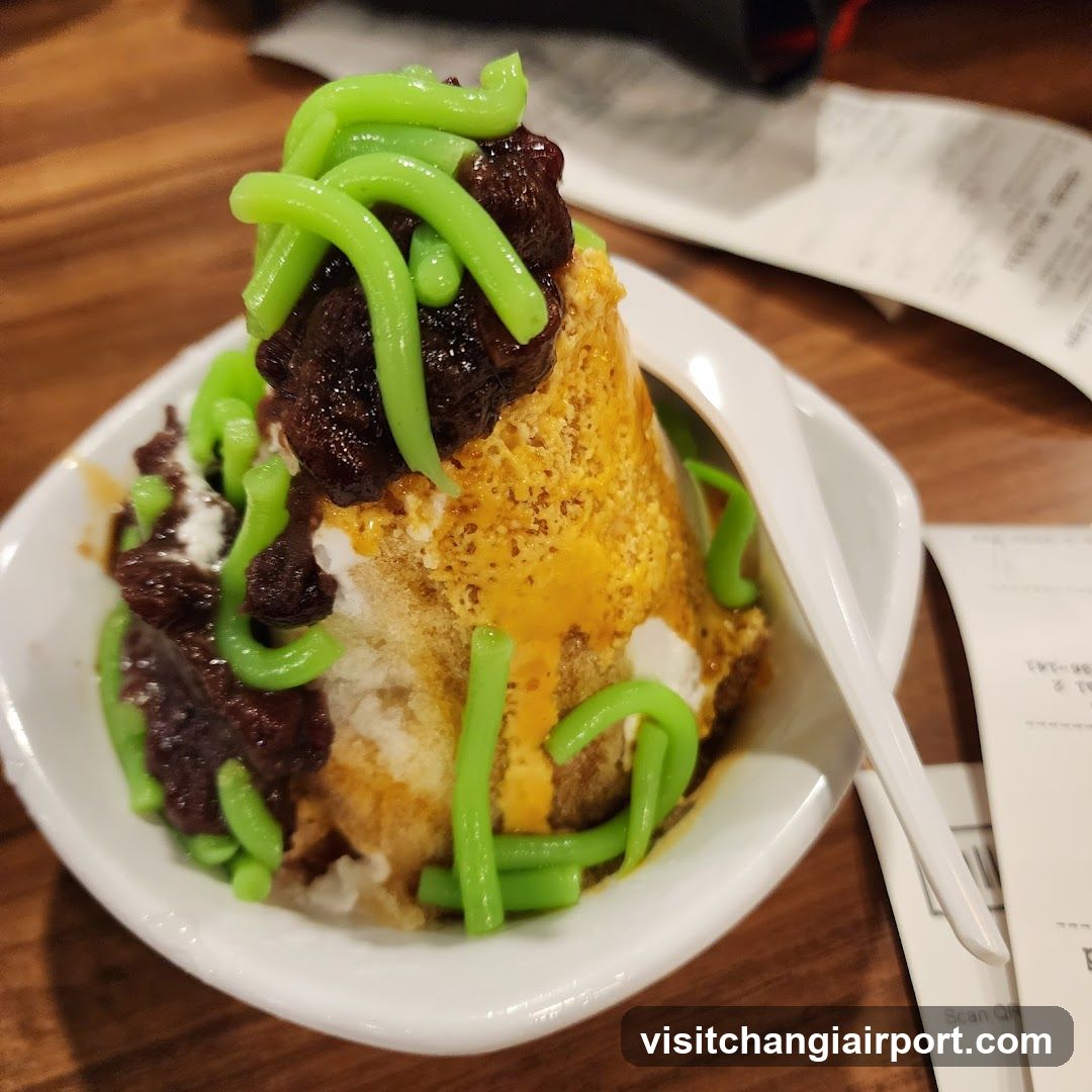 Dessert with green noodles and brown topping