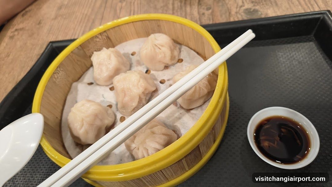 Dim Sum with Chopsticks and Soy Sauce