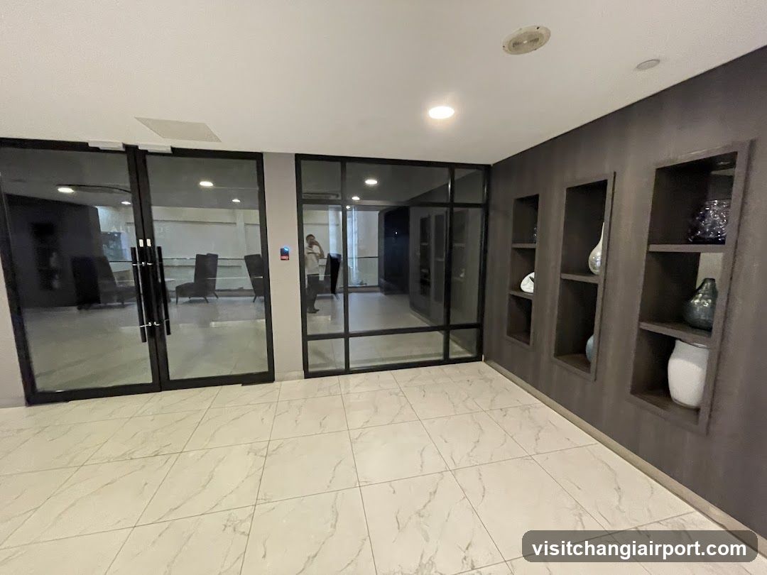 Modern Interior Space with Glass Doors and Shelving