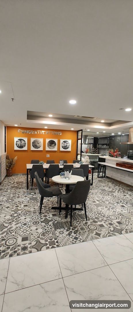 Interior Dining Area with Decorative Tiles and Kitchen