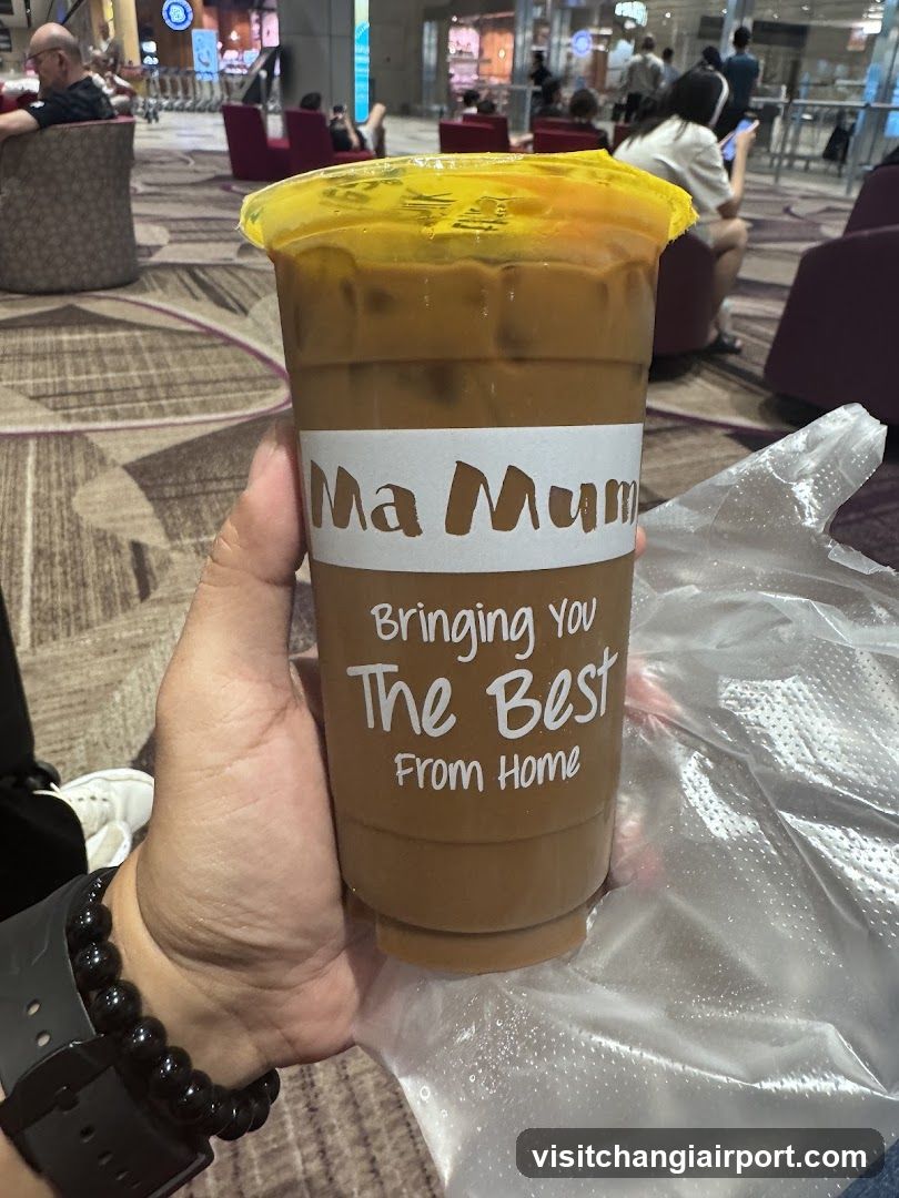 Iced coffee cup held in hand