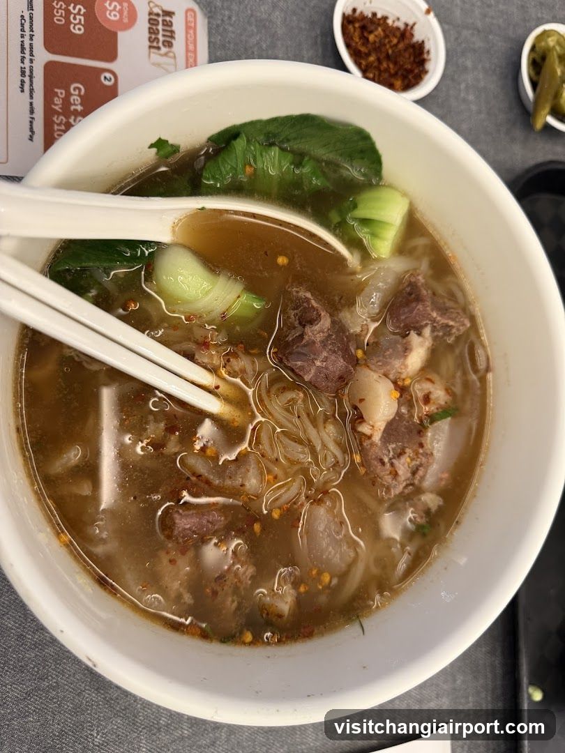 Bowl of Noodle Soup with Chopsticks