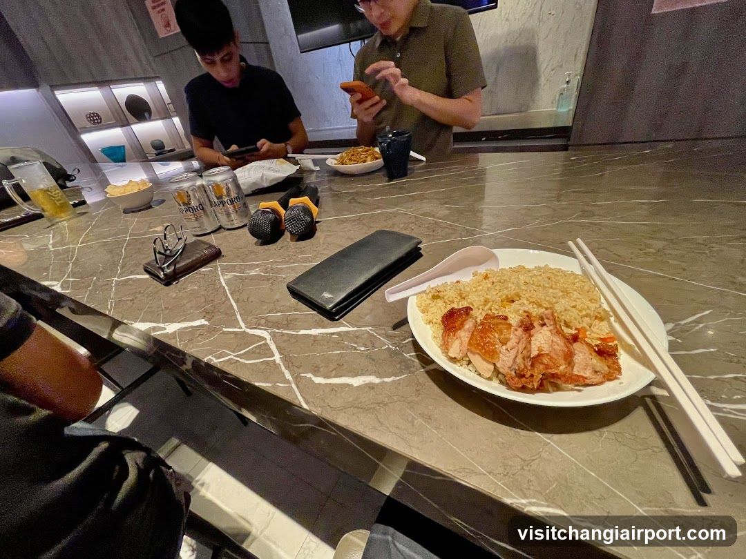 Karaoke Room Interior with Food and Drinks