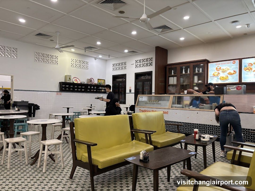 Dining Interior with Yellow Sofas and Staff