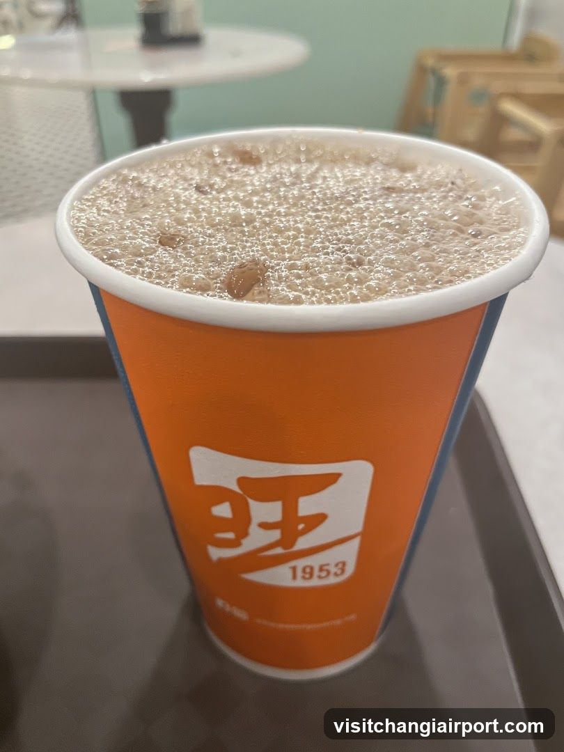 Beverage in branded cup