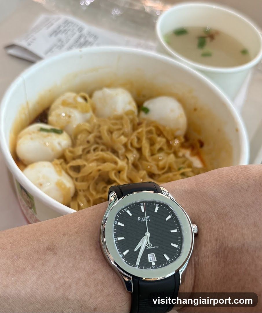 Noodle Bowl with Fish Balls and Watch