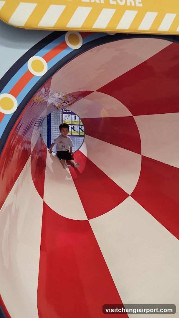 Child Sliding in a Tunnel