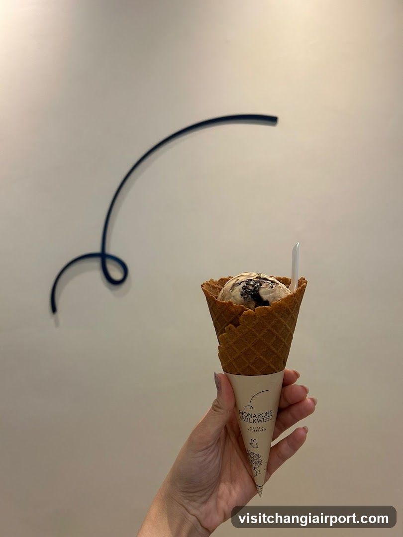 Ice cream cone with waffle cone and spoon