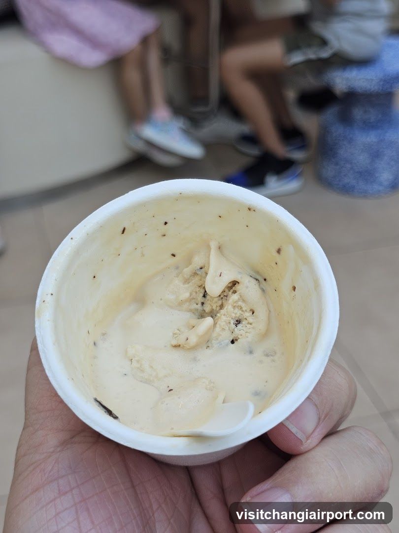 Ice cream cup in hand