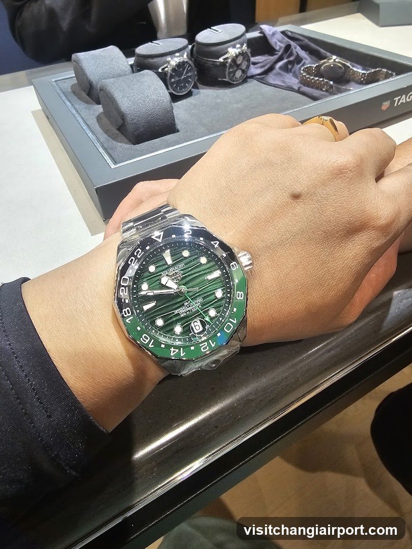 Watch Display Case with Green Diver Watch on Wrist