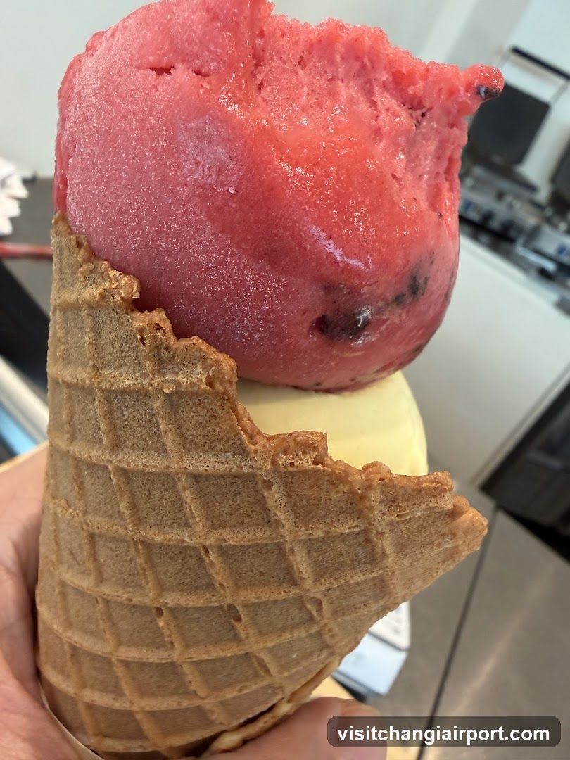 Ice Cream Cone with Pink and Yellow Scoops