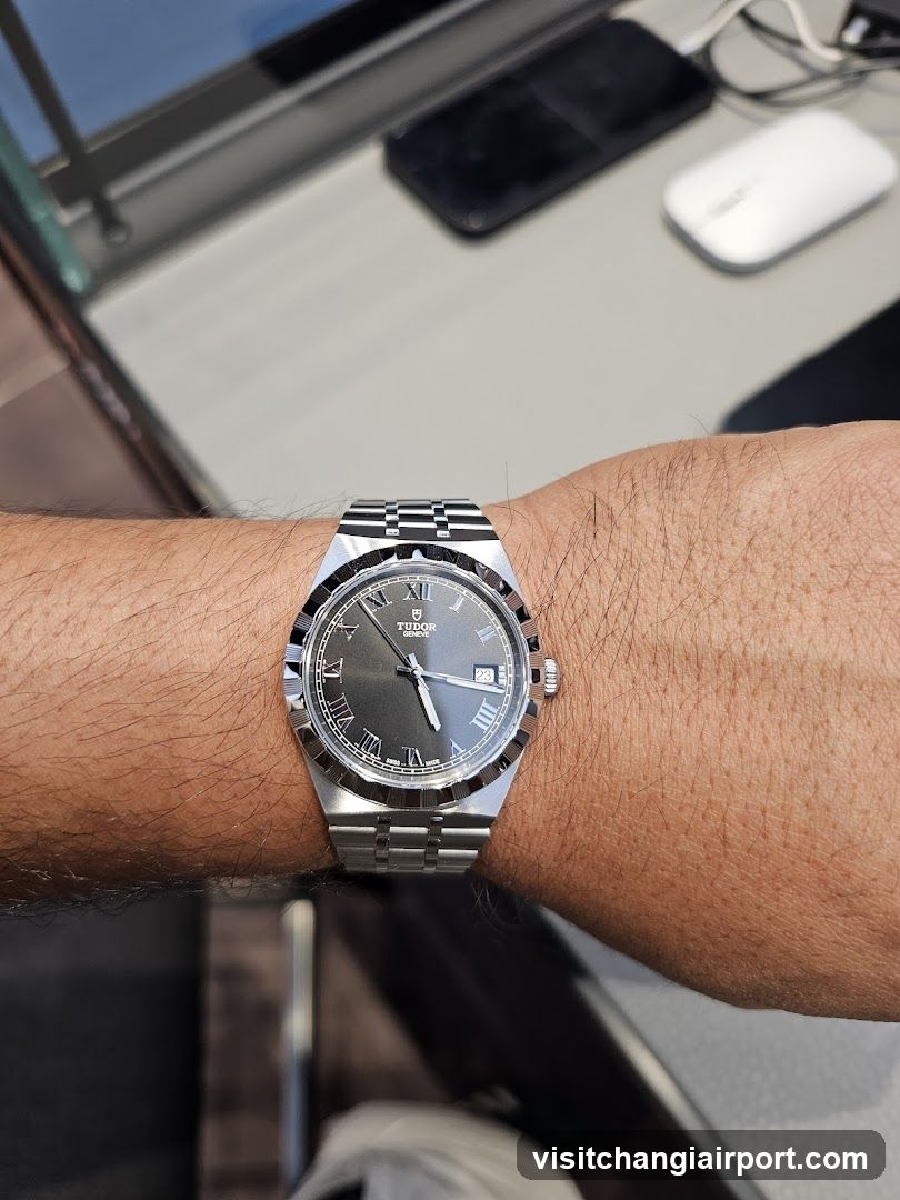 Watch on wrist with desk background
