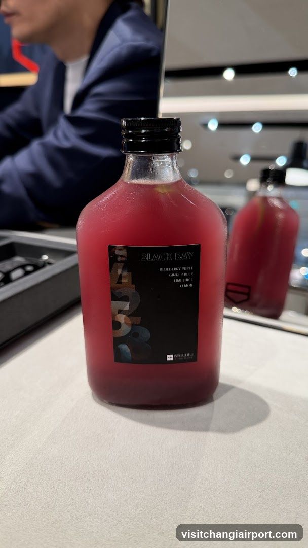 Bottle of Pink Drink on Counter