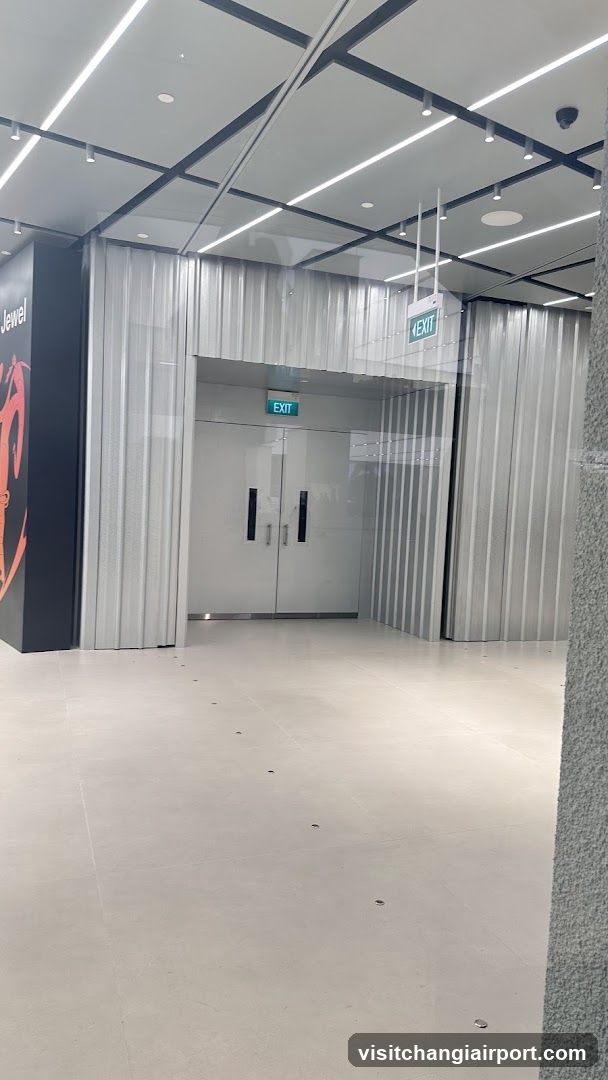Empty Interior Space with Exit Signs