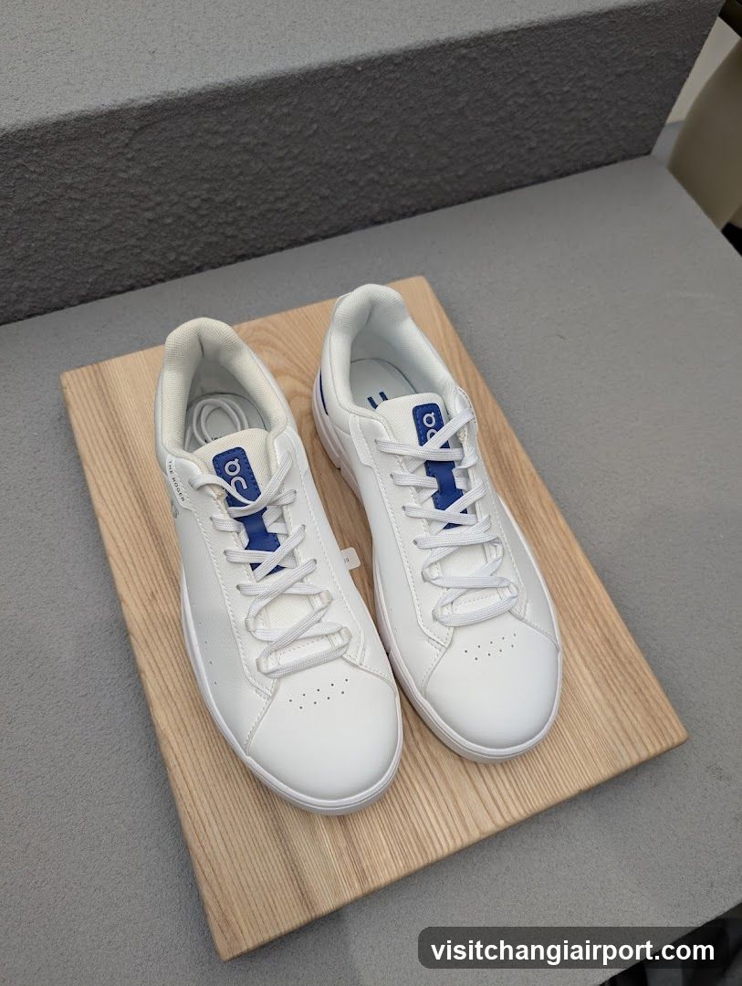 White Sneakers on Wooden Board