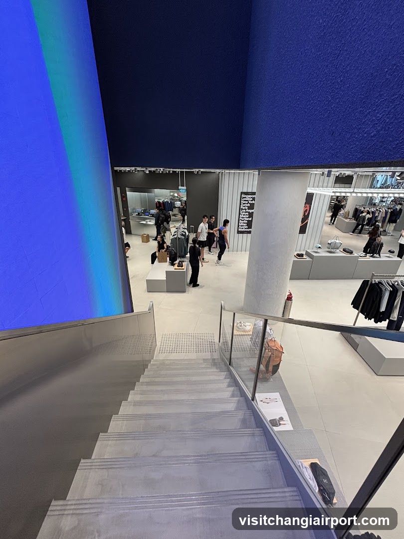 Interior of a modern clothing store with staircase