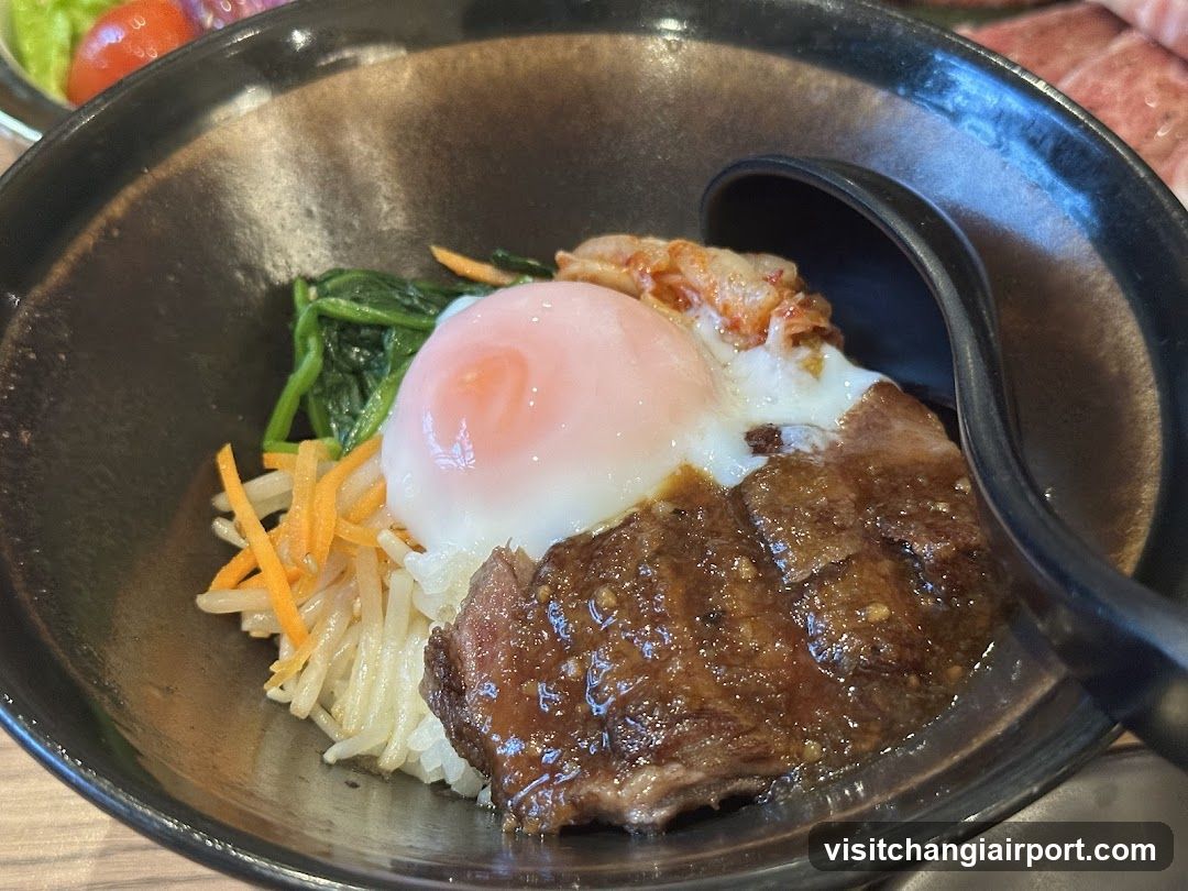 Bowl of Beef Rice with Egg and Vegetables