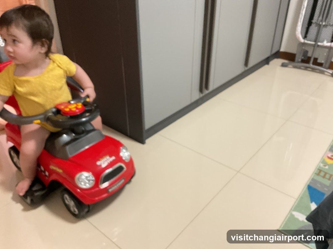 Toddler in Toy Car