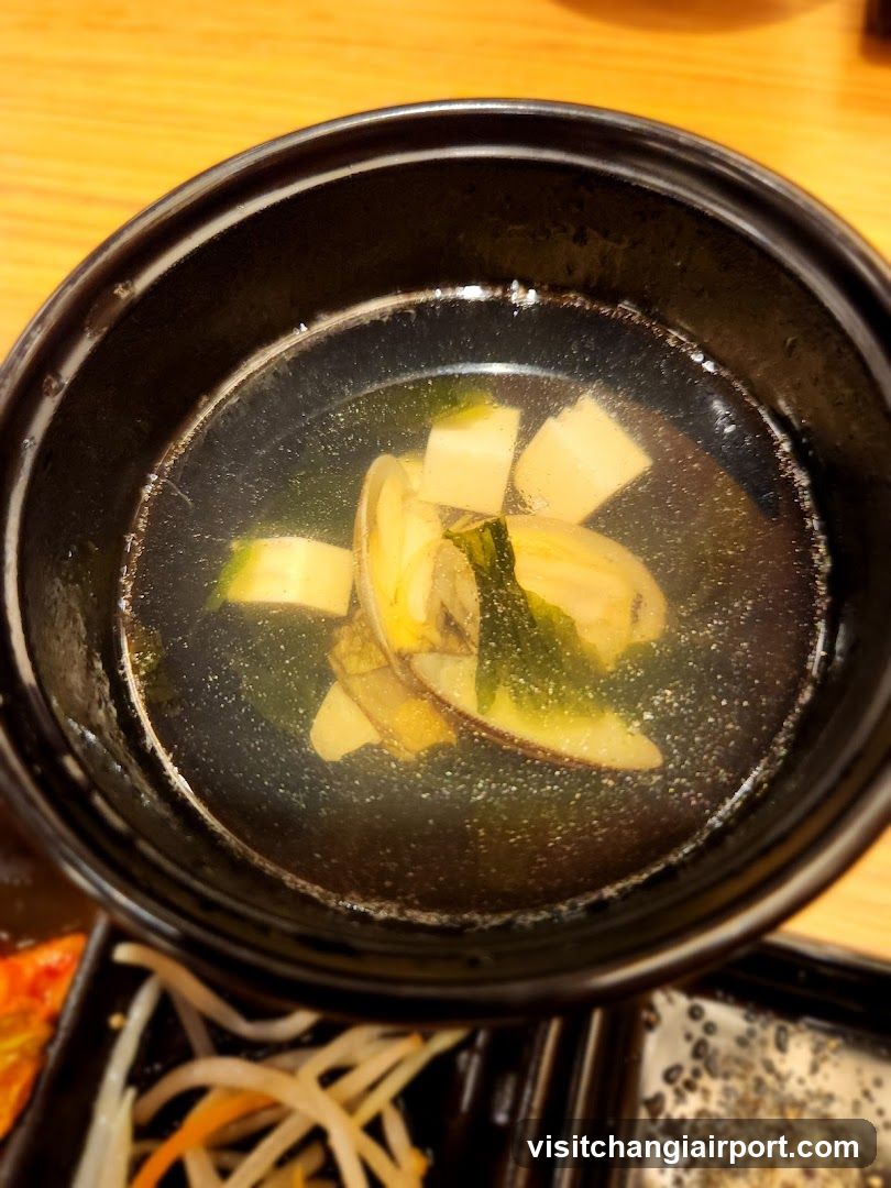 Clam Soup in Black Bowl