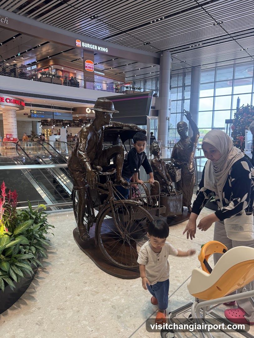 Airport Interior with Statue Display