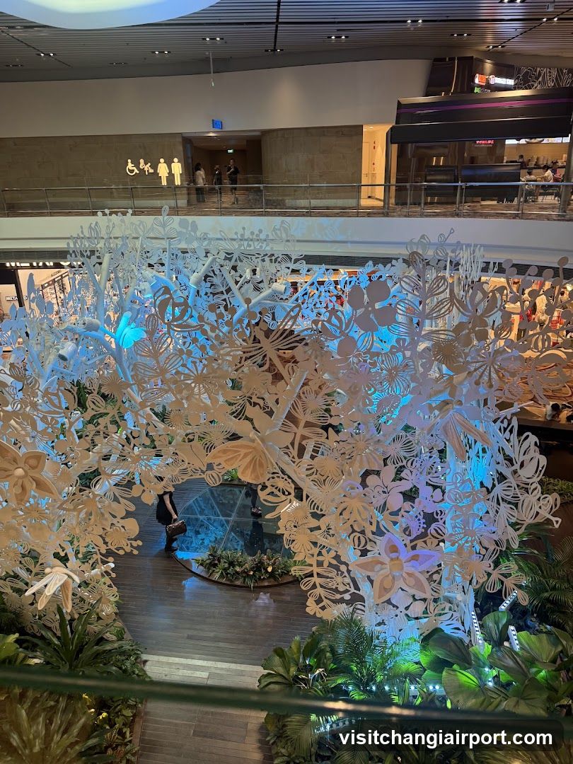 Indoor Mall Interior with Floral Installation