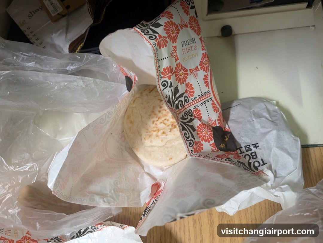 Unwrapped Flatbread in Packaging