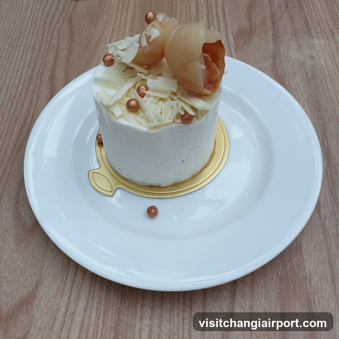 White Cake with Lychee and White Chocolate Shavings