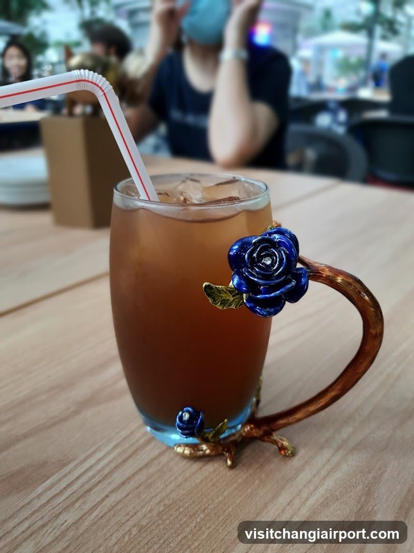Decorated Iced Tea with Blue Rose Handle