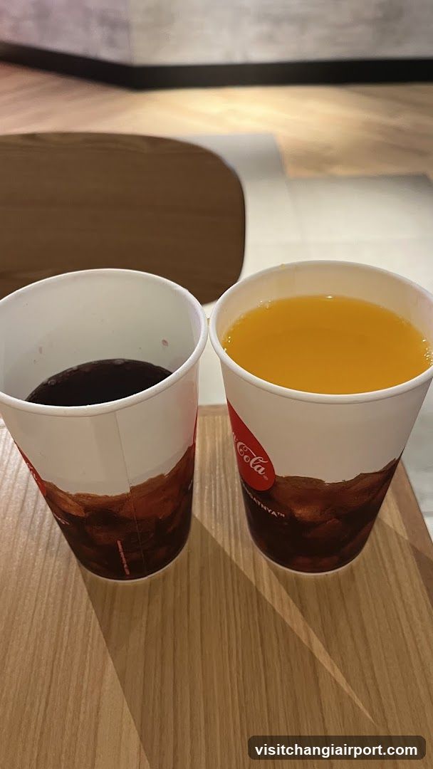 Two beverages in branded cups