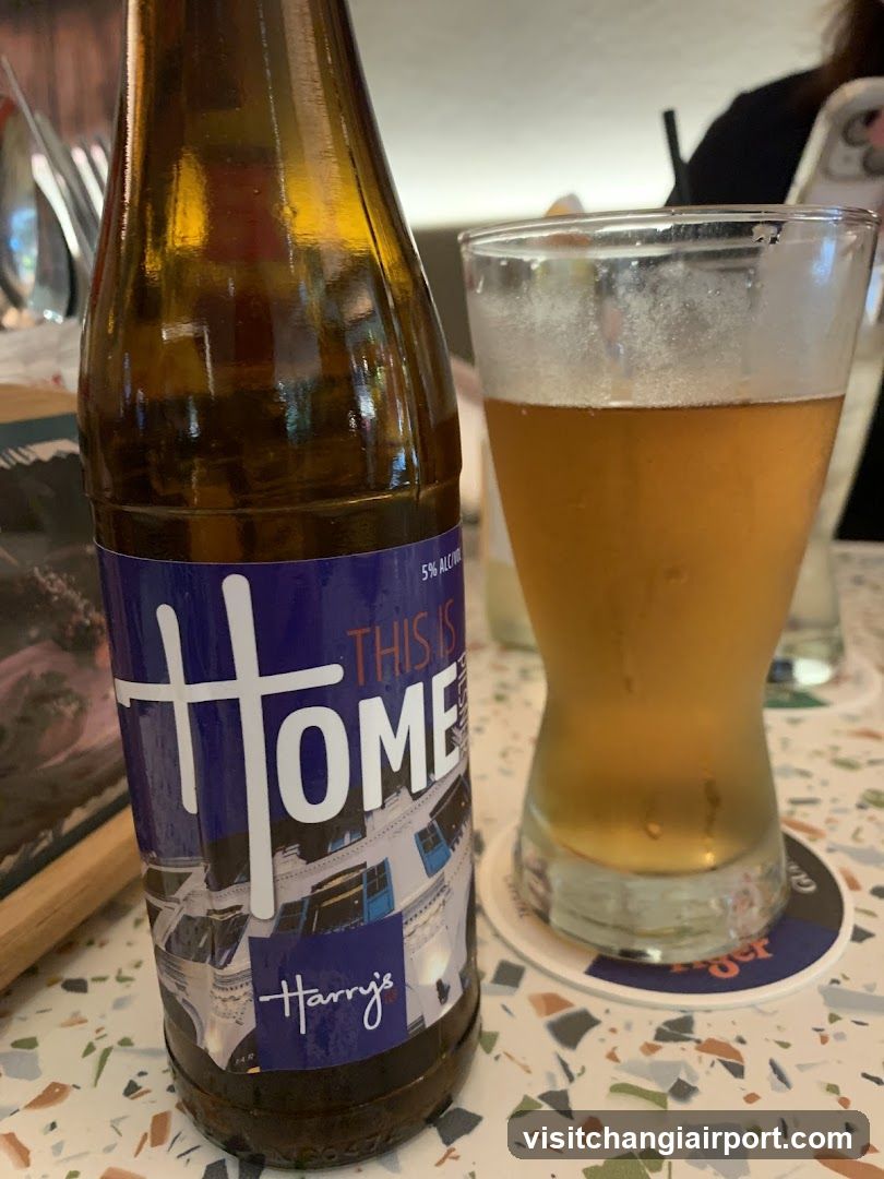 Beer Bottle and Glass on Table