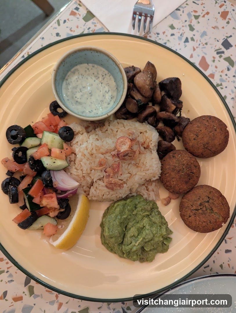 Plate of Food with Rice, Fajita, Salad and Guacamole