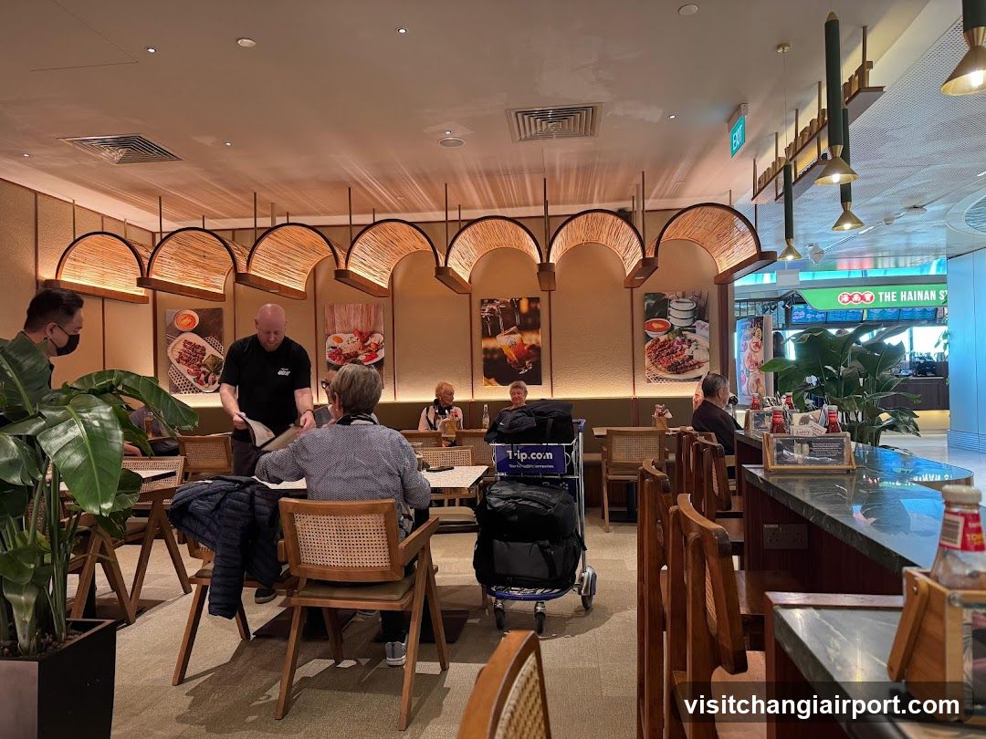 Restaurant Interior with Staff Serving