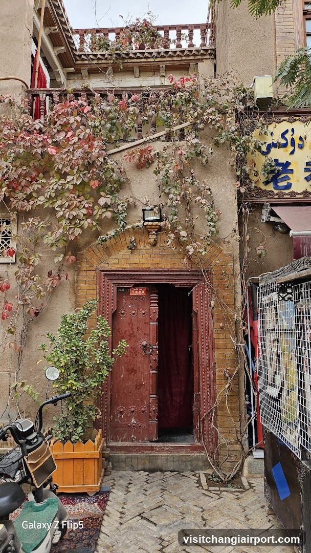 Traditional Building Entrance with Shop Signage