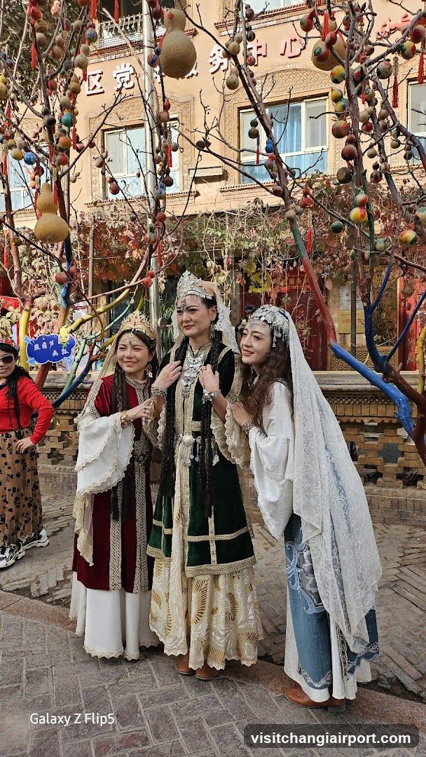 Traditional Costumes in Decorative Setting