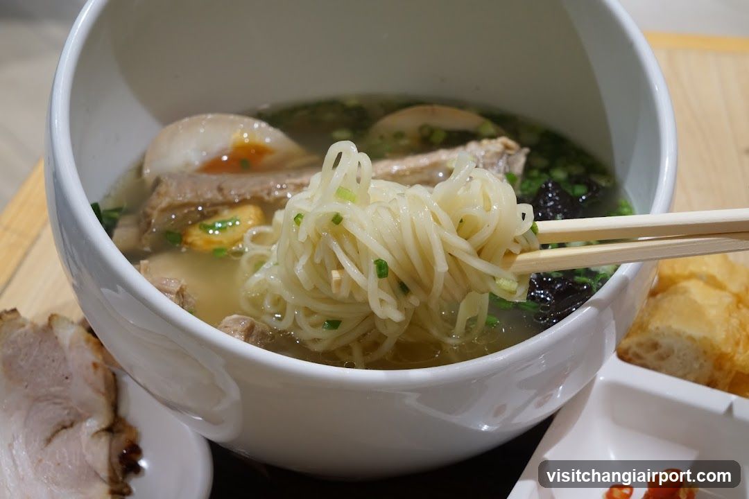Bowl of Noodle Soup with Chopsticks