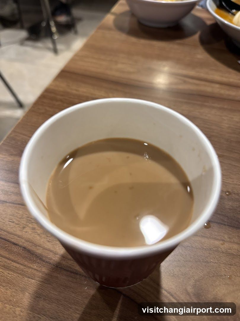 Cup of coffee on wooden table
