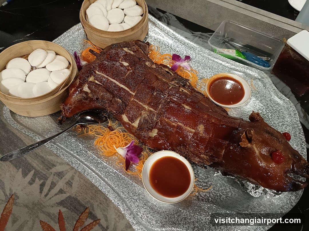 Roast Pig with Dipping Sauces and Steamed Buns