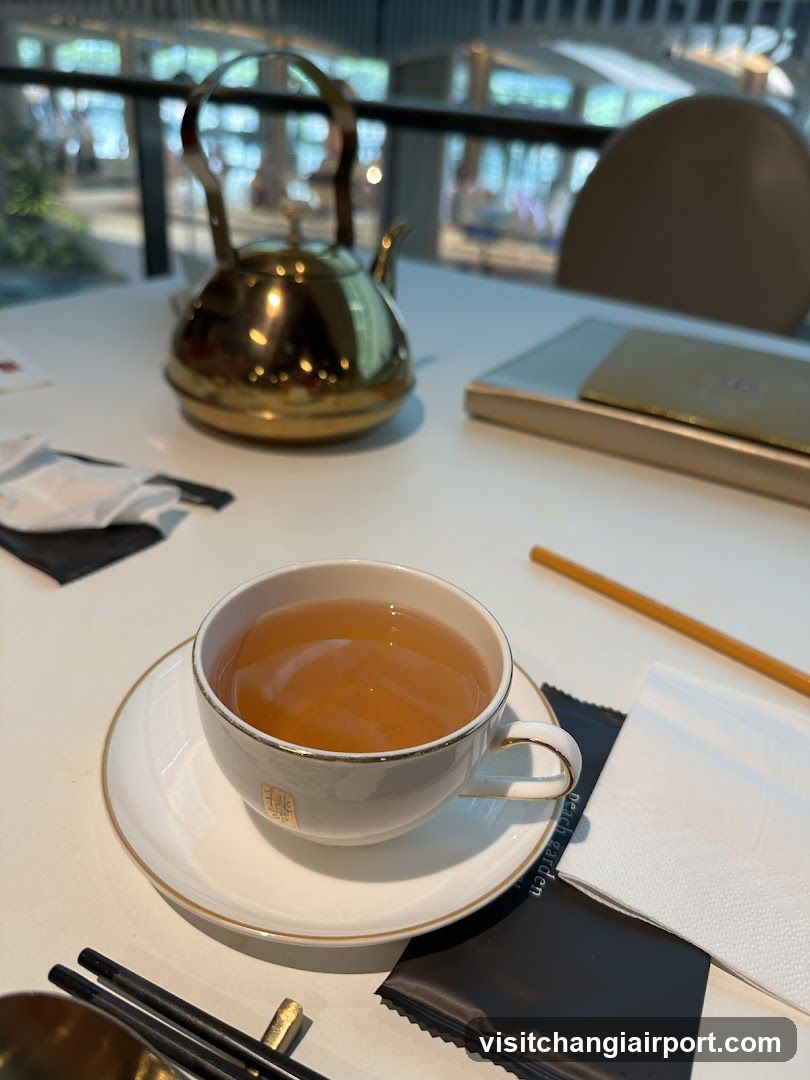 Tea Cup and Teapot on Table